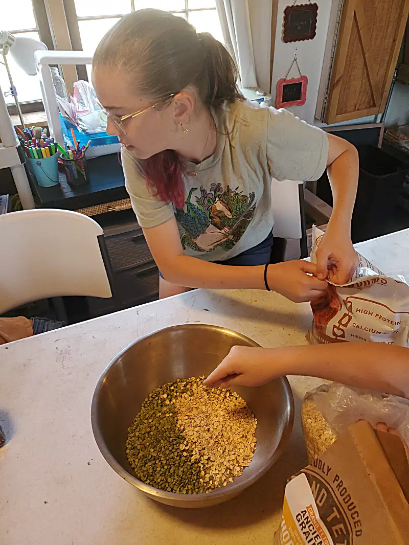 Young student learning hands-on farming skills in the morning session